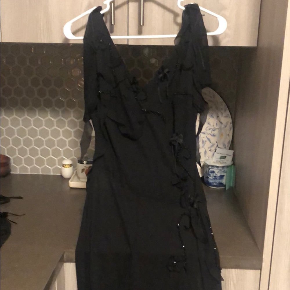 Elegant Black Dress with Slacks and Floral Accents
